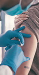 Vaccine, people and hands with ppe in clinic, medical appointment and flu immunization for health. Dressing, patient or doctor with injection for illness prevention, mask or immune system benefits
