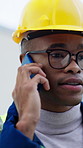 Architect, phone call and man with helmet in city, discussion and planning for property development. Outdoor, civil engineering and black person with mobile, communication and project management