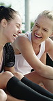 Soccer, team and women outdoor with laugh for funny joke, bonding together and break for practice. Football player, people and happy at sport club with friends, humor or exercise recovery for fitness