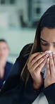 Blowing nose, sick and business woman in meeting, bacteria infection or allergies in office. Team, worker and person with flu virus in company, cold symptoms and health risk with tissue for sneeze