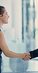 Laugh, handshake or business people with deal in office, brand collaboration or marketing partnership. Agreement, happy or women with support for audience expansion, shaking hands or alliance meeting