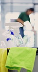 Detergent, supplies and cleaning with woman in office, hygiene and remove dust for sanitation. Cleaner, equipment and mop in workplace for floor disinfection, cleanliness and wiping dirt for wellness