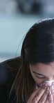 Sick, woman and sneezing with tissue in office, discomfort and reaction to colleague with allergies. Coworking, people and disgusted coworker with laptop, illness or blowing nose with flu in business