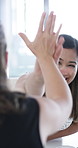 Happy, women and high five in office with success, public relations goals or well done for coworker. People, celebration or congratulations in business with PR achievement, collaboration or teamwork.