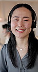 Face, consultant and happy woman with headset in call center office for online advice or telesales. Portrait, female person or friendly agent with smile or mic for virtual assistance, help or support