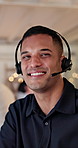 Face, agent and happy man with headset in call center office for online advice or telesales. Portrait, male person or friendly consultant with smile or mic for virtual assistance, help or support