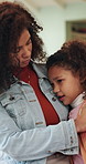 Mom, girl and hug on sofa with care, love and bonding with connection, discussion and comfort in lounge. People, mother and daughter with embrace, relationship or relax on couch at family house