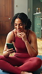 Fitness, woman and laughing in home with mobile, funny notification and viral yoga trend on internet. Girl, break and phone on mat for social media, typing comment and thinking of pilates joke