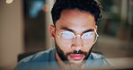 Glasses, man and computer research in office for global market activity, stocks insight or overtime. Eyewear reflection, trader or tech review at night for risk management, trade decision or deadline