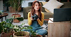 Plant, photography and laptop with woman in home for gardening blog, social media and research. Organic guide, botany tips and leaf picture with person and camera in house as content creator