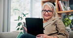 Relax, smile and tablet with old woman on sofa in living room of home for ebook reading. App, glasses and story with happy senior at apartment for break, literature hobby or me time in retirement