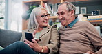 Streaming, laugh or old couple in home with phone, funny video or social media scroll in retirement. Smile, digital or elderly people with tech, online comic or humor reaction on multimedia platform.