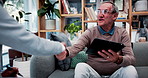 Old man, tablet and insurance agent in home with handshake, retirement planning or policy deal. Elderly client, tech and shaking hands in living room for consultant, pension agreement or registration