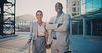 Suitcase, crossed arms and face of business people in city with confidence for legal career with travel. Happy, professional and portrait of attorneys with pride for law case with luggage in town.
