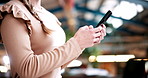 Student, hands and typing in college with phone, text message and social media post on study break. Bokeh, woman browse or online chat in university with tech, learning or email for higher education.
