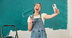 Woman, face and painting in home renovation selfie, filming or record with smile and paint roller. Interior design, house and Asian creator with decorating memory, social media or painter live stream
