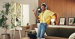 Dancing, student and woman with headphones in home, online or celebration for exam results on laptop. Black person, rhythm and listening to music with tech, happy and academic success in living room