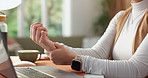 Hands, laptop and wrist pain with remote work in home, overwork or typing strain with carpal tunnel. Woman, aching joint or injury with pc for writing, WFH or freelancer with rheumatoid arthritis