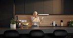 Coffee, drink and woman with phone in kitchen, reading funny message and check app for notification. Home, social media and mature person with mobile for laughing, browsing feed or happy for beverage