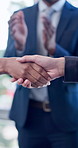 Applause, business people and handshake for partnership, deal or financial acquisition in office. Clap, shaking hands or celebration for investment success, corporate consolidation and company merger