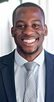 Realtor, face or black man in office with smile, career pride or ambition in property management. Happy, portrait or real estate agent with confidence, about us or optimism as housing consultant.