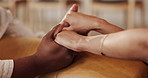 Holding hands, love and couple in home for support, comfort or bonding together in living room. Care, empathy and people for connection with commitment, hope or marriage with compassion in apartment