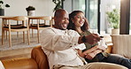 Home, relax and couple with remote for watching tv, weekend bonding and series for entertainment. Streaming movie, tech and African people with smile for film broadcast, break or watch show together