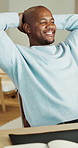 Black man, stretching and laptop for remote work, relax and writing for proposal living room. Apartment, freelancer and African person with happiness, complete task and comfort with break and home