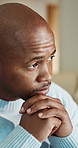 Thinking, black man and stress for remote work, choice or reading information online for proposal. Home, confused and African entrepreneur with planning, doubt and project rejection with solution