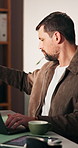 Check, laptop and man in office for shipping, supply chain or logistics for delivery startup. Business, label and person on computer for inventory, distribution or package receipt for courier service