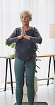 Breathe, yoga and old woman in home with meditation, spiritual healing and holistic balance for zen. Senior person, yogi and namaste pose at house for inner peace, practice mindfulness and retirement