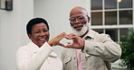 Face, heart and new house with senior couple, love sign and partner affection for real estate. Portrait, black people or laugh with hand gesture for care, support and gratitude of property investment