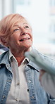 Healthcare, senior woman and nurse with tablet, talking or happy for medical appointment in hospital. Clinic, health professional and discussion with elderly person, smile and test results on website