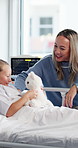 Hospital, visit and mom with child with teddy bear for comfort, support and bonding for recovery. Healthcare, family and mother with girl for love, compassion and empathy for healing, care and trust
