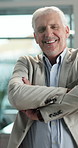 Crossed arms, smile and face of businessman in office with confidence for finance career. Professional, corporate and portrait of male financial manager with pride for company about us in workplace.