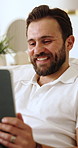 Relax, tablet and man on sofa in home for reading blog on saving, investment or finance tips. Happy, digital technology and male person in living room for website on financial growth with advice app.