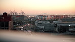 City, vehicles or night with road traffic in urban settlement of local township, destination or landmark. Cars, path or street in late evening with buildings, sky or space for economic transportation