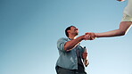 Business, merger or people outdoor with handshake, friendly greeting or negotiation in b2b deal. Space, low angle or employees with shaking hands, networking agreement or introduction in partnership.