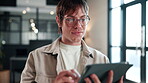 Smile, man and tablet with reading in office for publication revision, blog approval and editing. Creative, editor and scroll with tech at media agency for story review, grammar check and submission