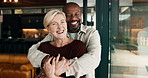 Happy, hug and face of couple in home with bonding, safety and connection in marriage together. Laugh, love and portrait of mature man embracing woman for trust, commitment or loyalty in relationship