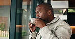 Window, thinking or mature black man with coffee in home for nostalgia, past memory or reflection. Thoughtful, male person or drinking with mug or glass for vision, ambition or contemplation in house