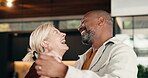 Dancing, happy and couple in home with music for bonding, love and safety in marriage on weekend. Smile, interracial people and mature man with woman for moving to playlist, radio or album in house.