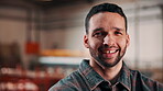 Laughing, carpenter and face of man in workshop for woodwork, manufacturing and joinery. Furniture factory, restoration and craftsmanship with person in warehouse for space, joke and about us