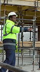 Black man, engineer and walking at site with phone call, inspection or planning for architecture. Smile, person and discussion with mobile, quality assurance and instructions for building development