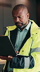 Black man, architect and typing at house with laptop, research and email for architecture. Mature person, reading and pc for survey update, quality assurance and information for property development