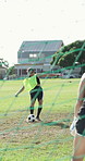 Soccer, penalty and goalkeeper on field with team, practice technique and training to score goal. Women, football player and shooting skills at club with net outdoor, fitness and exercise for sports.