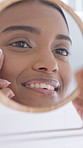 Happy, woman and skincare with mirror in bathroom for morning routine or satisfaction in home. Female person, smile or reflection with smooth skin, makeup or cosmetics for beauty or cosmetology