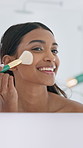 Brush, mirror and woman in bathroom at house with beauty, makeup or self care in morning for getting ready. Happy, tool and female person with face cosmetology routine for confidence in apartment.