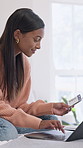 Woman, travel or ticket with laptop in home for online booking or flight schedule in bedroom. Female person, traveler or smile with boarding pass on computer for virtual checkin or planning itinerary