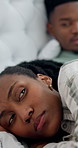 Angry, woman and couple in bed with conflict, argument and tension from disagreement. Upset, black people or ignoring partner in home for silent treatment, emotional distance and sleepless with drama
